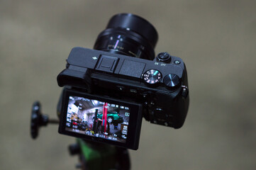 the process of filming a turbo car green on a black camera a mechanic disassembles an old dirty car...