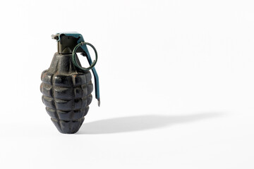 Old grenade on white background
