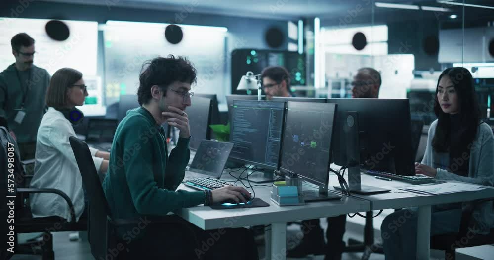 Aufkleber team of talented young professionals working in a technological research and development facility. d