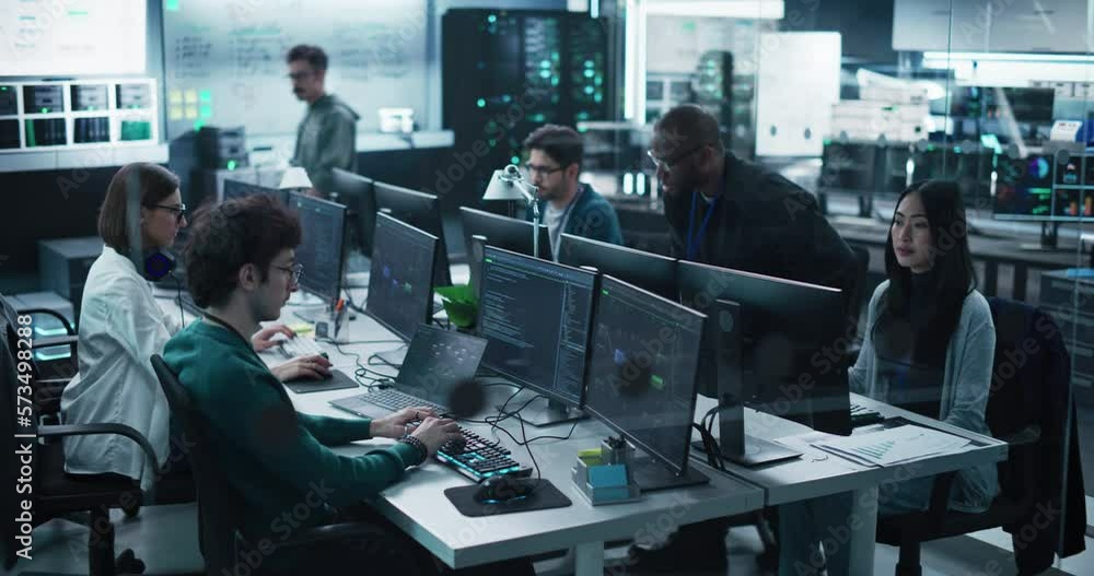 Fototapete Group of Empowered Multicultural Men and Women Working in a Research Center, Using Computers to Run Advanced Software, Develop Artificial Intelligence Interface and Cloud Computing Blockchain