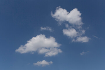 white clouds in a blue sky