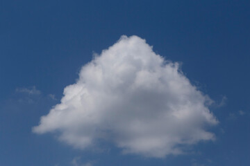 white cloud looking like pyramid in a blue sky
