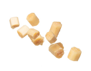 Sugar cane cut chop flying explosion, yellow chop sugarcane abstract cloud fly. Sugar sugarcane cut cubes splash stop in air, food object design. white background isolated high speed freeze motion