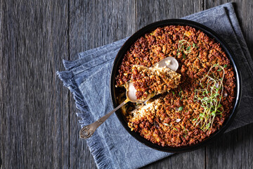 Tasty Bake with meat, mushrooms, cheese, onion