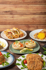 Ramadan table. Turkish food on wooden background. Iftar and sahur delicacies. Turkish oriental dishes. Types of appetizers. close up