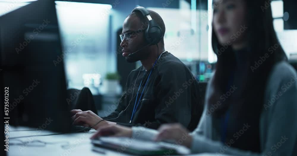 Aufkleber portrait of a smart african young specialist working in a technological startup help desk department