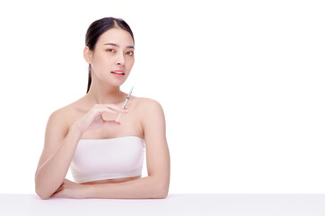 Female holding a syringe with an injection. Cosmetic procedures, Botulinum toxin injections, hyaluronic acid.