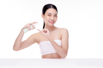 Woman pushing pump plastic cream bottle with copy space. using skin care moisturizer dispenser. Hygiene skin body care concept.