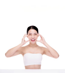 Beautiful woman massaging her face , pinch and roll technique.Isolated over white background.