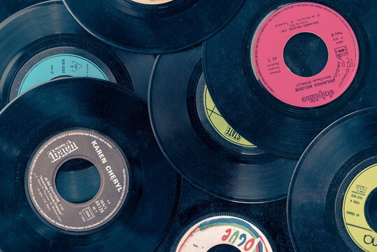Collection of old colorful vinyl records, vintage music background