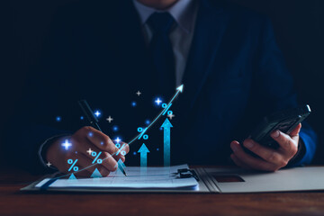 Interest rate and dividend concept. Businessman with percentage symbol and up arrow, Interest rates continue to increase, return on stocks and mutual funds, long term investment for retirement.