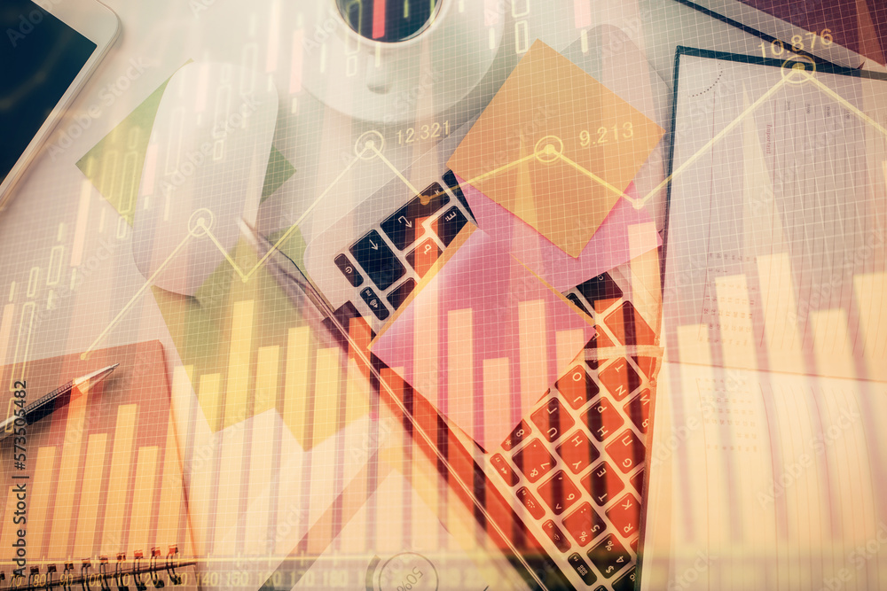 Aufkleber Multi exposure of financial chart drawing over table background with computer. Concept of research and analysis. Top view.