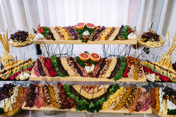 Snacks set. Wooden boards plates with different delicious snacks. Appetizers table with Italian antipasti snacks. Authentic traditional Spanish tapas set.