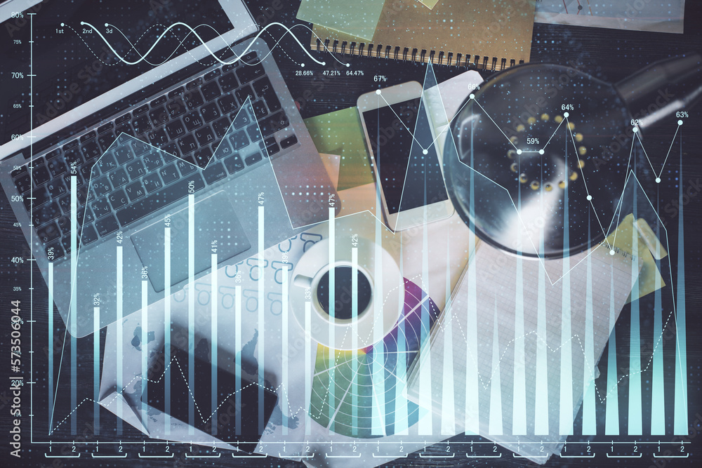 Poster financial market graph and top view computer on the desktop background. multi exposure. investment c