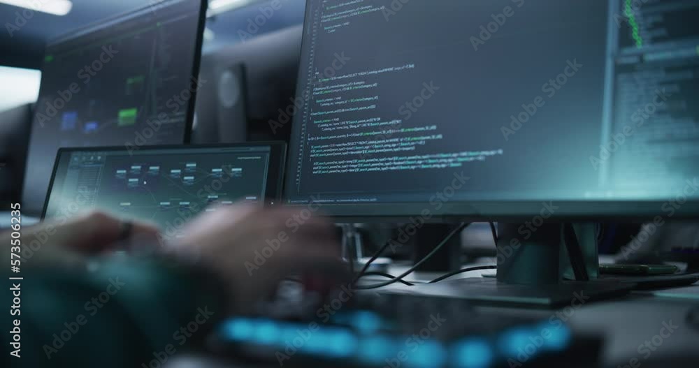 Fototapete Close Up of a Software Developer Working on a Desktop Computer, Typing Programming Code on Keyboard. Professional Employee Doing Work in a Cyber Security Technology Company