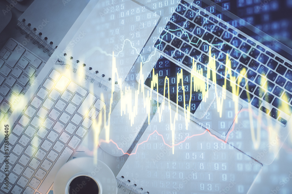 Poster financial market graph and top view computer on the desktop background. multi exposure. investment c