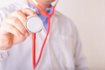 Doctor holding stethoscope for World diabetes day, doctor day or world health day