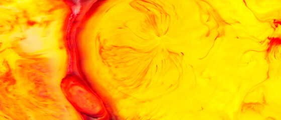 Fluid Art. Liquid red orange colors paint background. Colorful abstract watercolor texture. Liquid art concept