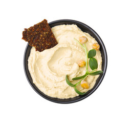 Bowl of delicious hummus with crispbread and chickpeas isolated on white, top view