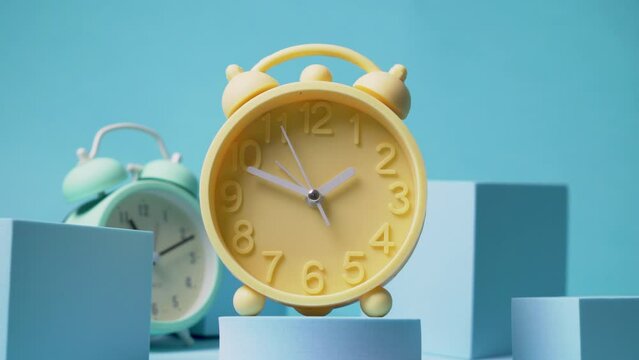 Spring time change 2023, daylight saving time spring forward: This stock footage captures the arrival of spring and the switch to daylight saving time. The clock hands move forward as the hour