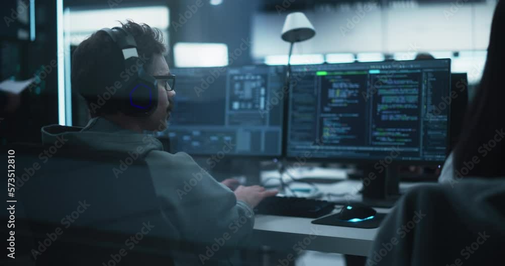 Poster Group of Empowered Multicultural Men and Women Working in a Research Center, Using Computers to Run Advanced Software and Develop Artificial Intelligence Interface. Footage from the Back