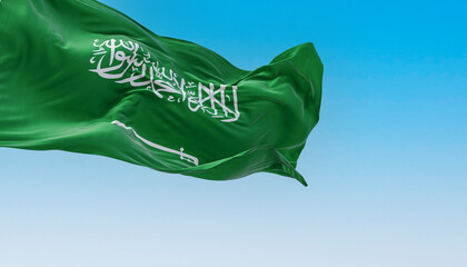 Saudi Arabia national flag waving in the wind on a clear day