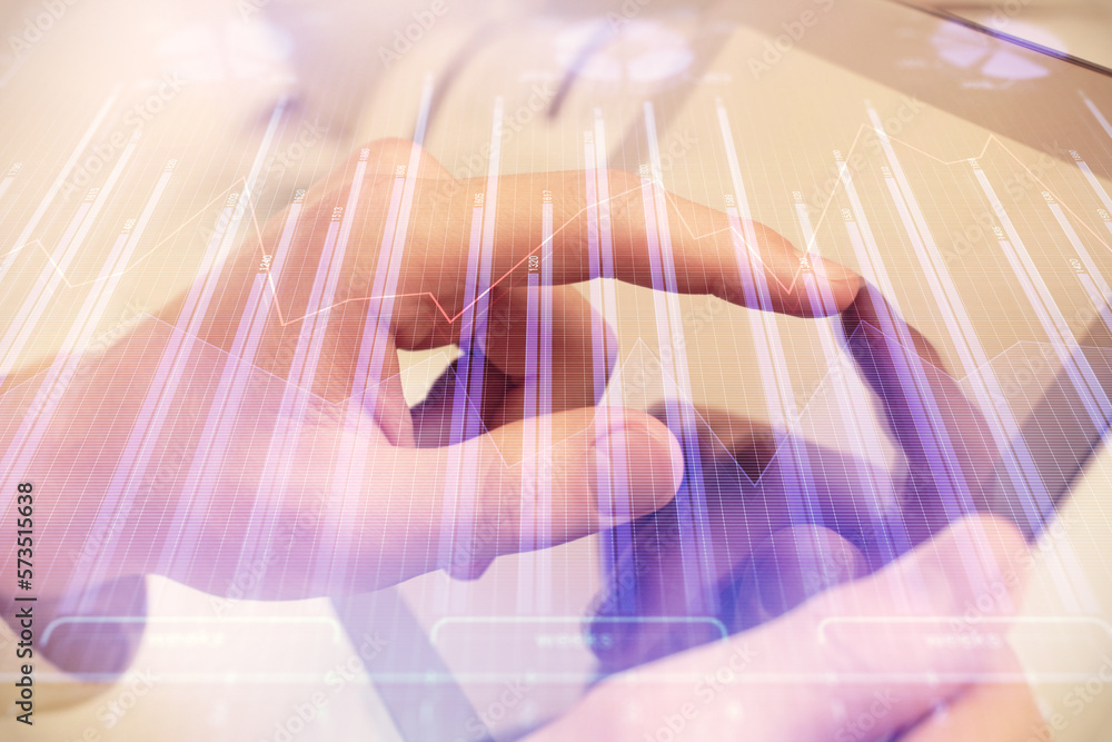 Poster multi exposure of man's hands holding and using a phone and financial chart drawing. market analysis