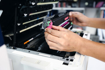Technician hand open cover printer photocopier or photocopy to replace ink cartridges or fix paper...