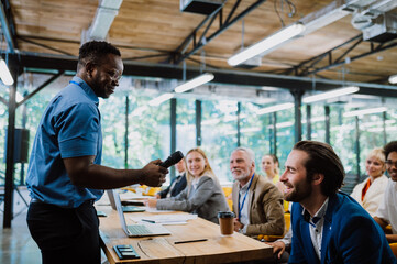 Cinematic image of a conference meeting.
