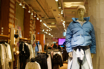 Fashion concept. Photo of stylish female mannequin demonstrating clothes in the store