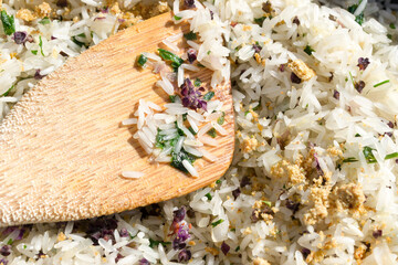 Bamboo spatula, rice, parsley, kilimanjaro basil flowers