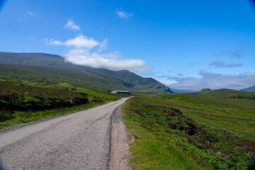 Fototapeta na wymiar NC500 route in the mountains Scotland
