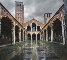 Fototapeta na wymiar Antique Sant'Ambrogio basilica on a rainy day,Milan - Italy.