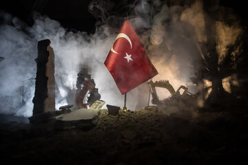 Turkey flag on the cracked earth. National flag of Turkey. Earthquake or drought concept