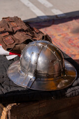 Medieval festival show, historical performance. Weapons, armor, utensils and objects of medieval...