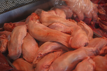 pig's feet cut in a butcher's shop.