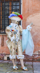 Fototapeta na wymiar Person in disguise - Venice Carnival-