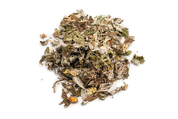 Dry tea leaves and dry fruit isolated on white background.