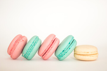 pink, blue and white macaroons isolated on white background
