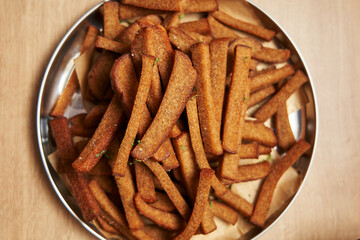 Rye bread croutons with garlic, oil and salt. rye bread garlic croutons on a silver round plate