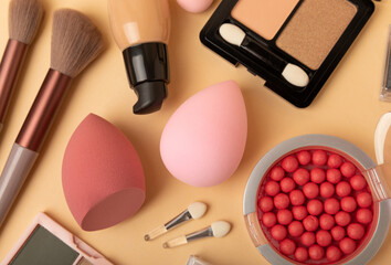 Beauty blender for applying bb cream or concealer and cosmetics on a bright colored background....