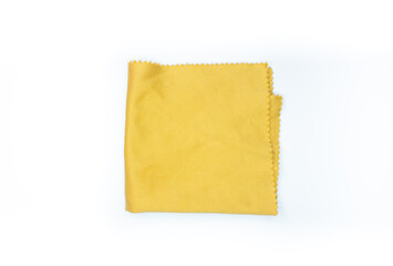 Yellow eye glass or lens cloth isolated on a white background. Top view, flat lay.