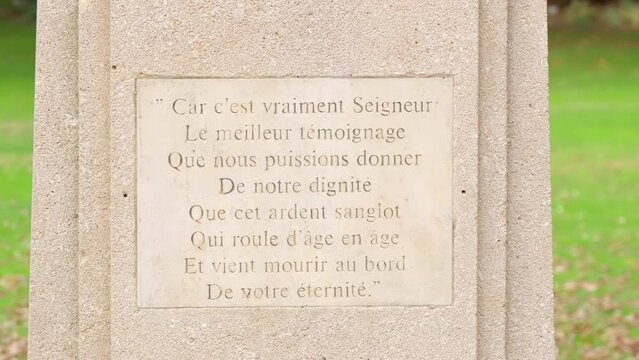 Quote from The Flowers of Evil, the Lighthouses, on the pedestal of the statue of Baudelaire in the Luxembourg Garden of Paris, France