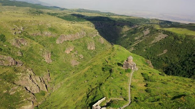 Drone view over the Vahramashen Chapel and famous Amberd fortress on the slope of Mount Aragats in Armenia. Travel attractions  in Armenia.