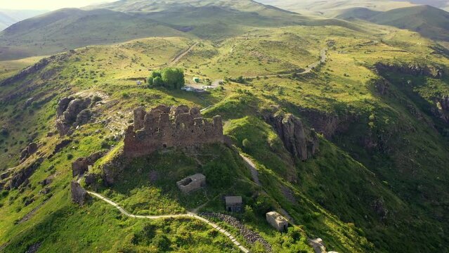 Drone view over  famous Amberd fortress on slope of Mount Aragats in Armenia. Travel attractions  in Armenia.