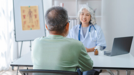 Elderly medical asian people with patient, Physical check-ups and encouragement for treatment of rheumatism and cancer The concept of health insurance for the elderly and health care