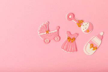 IT'S A GIRL! Baby shower cookies on a bright pink background. Gender cookies. Candy bar holiday baby shower party. Gender party. Holiday concept.