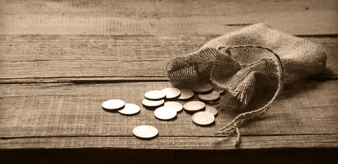 Thirty coins in a bag on the table