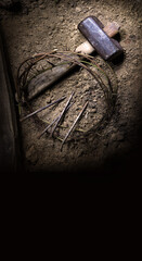 Rusty nails and a wreath of thorns at the cross