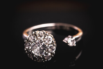 diamond ring on black background